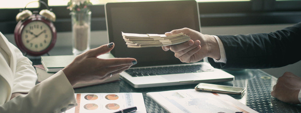 Negotiating the price of a used car at TM Motors in Riverside, CA