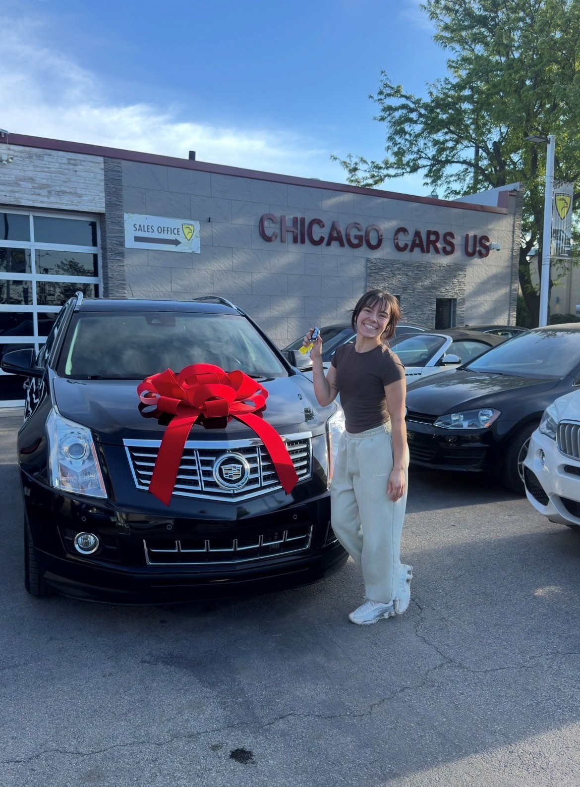 Customer driving home with their new vehicle from Chicago Cars US