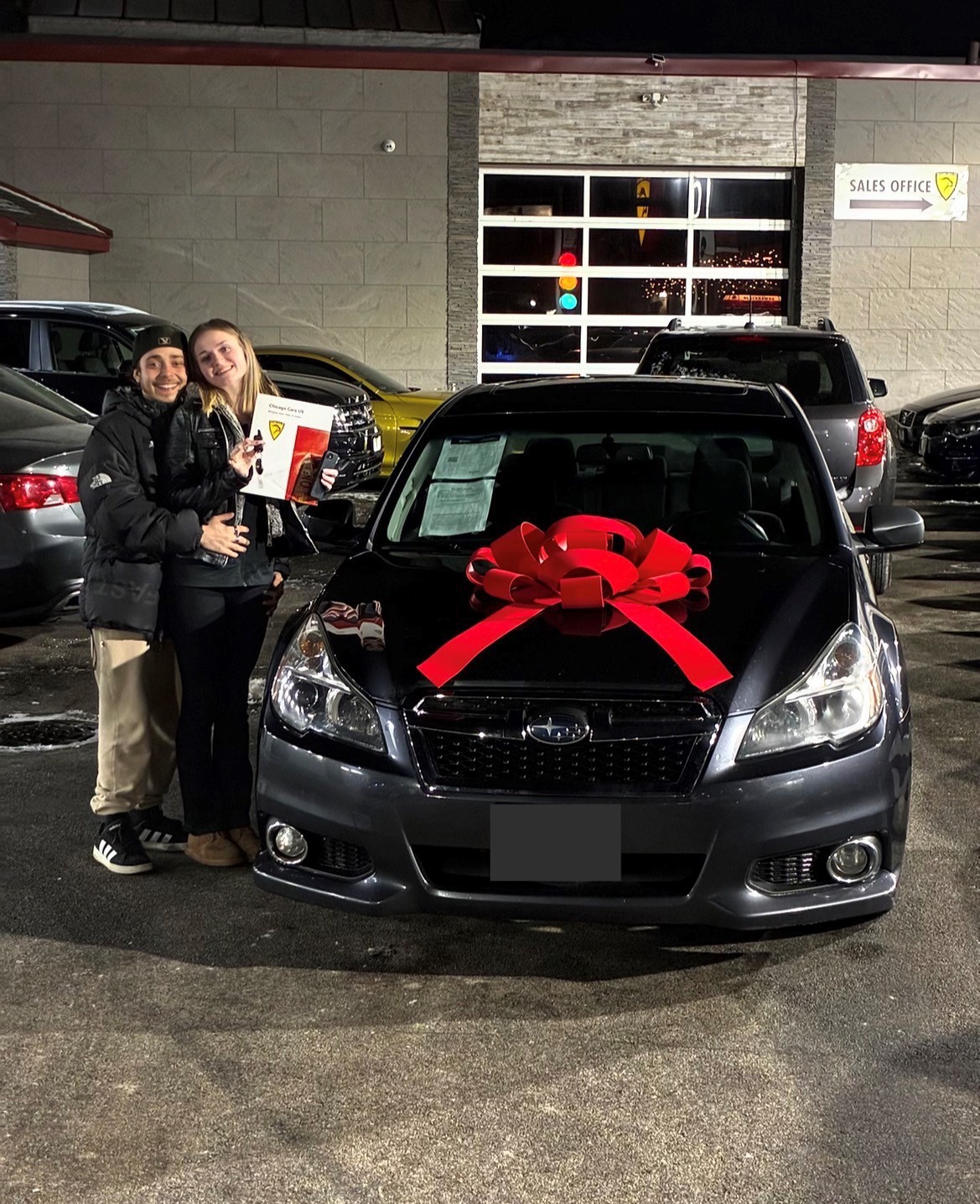 Another satisfied customer taking the keys to their dream car